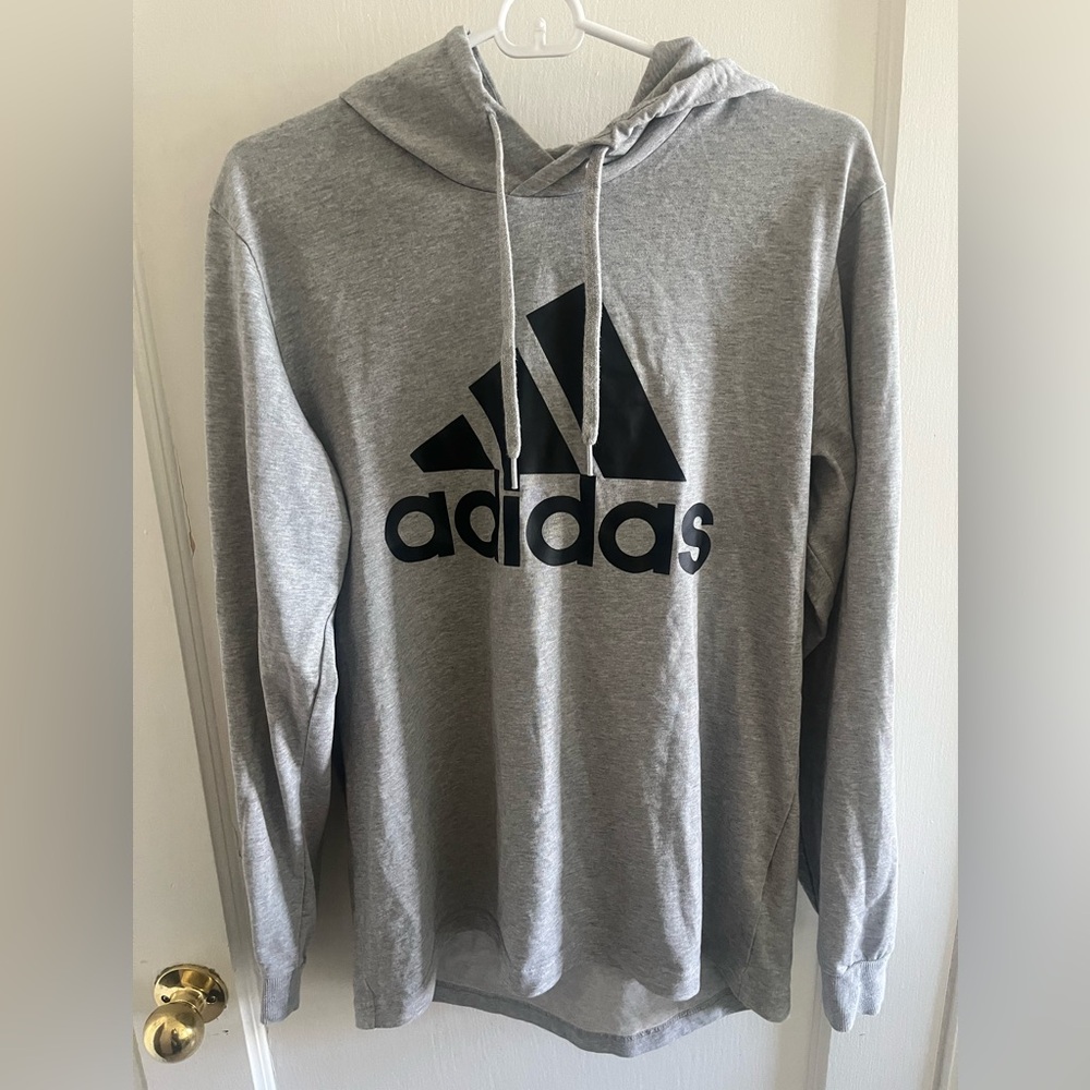 Adidas hooded shirt very good condition only worn once or twice. Size medium